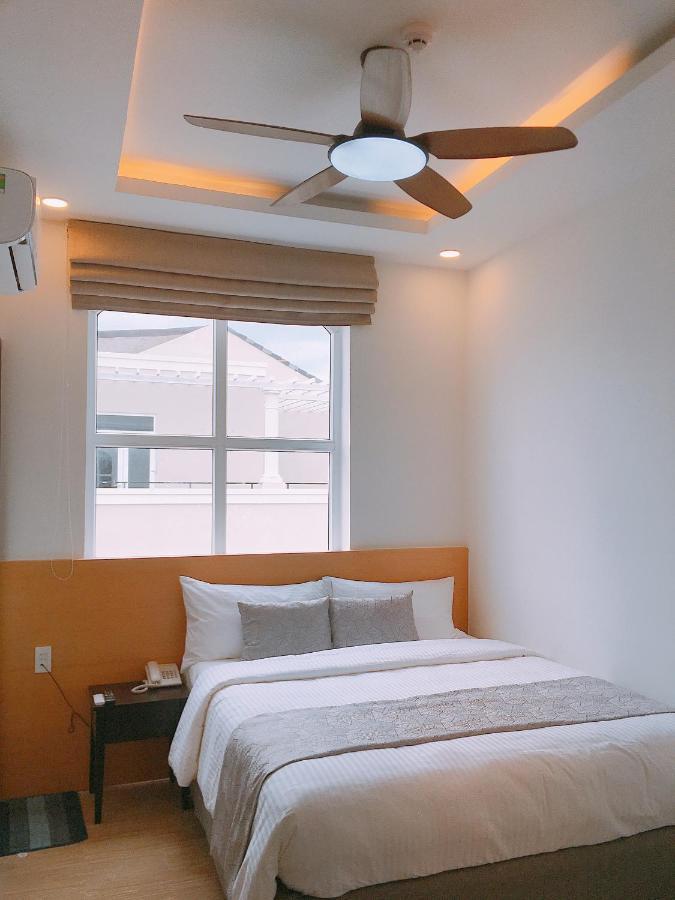 La Homestay Long Xuyen Bagian luar foto